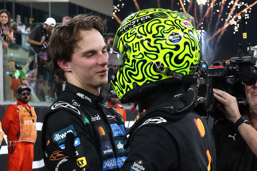 Oscar Piastri and Lando Norris hug