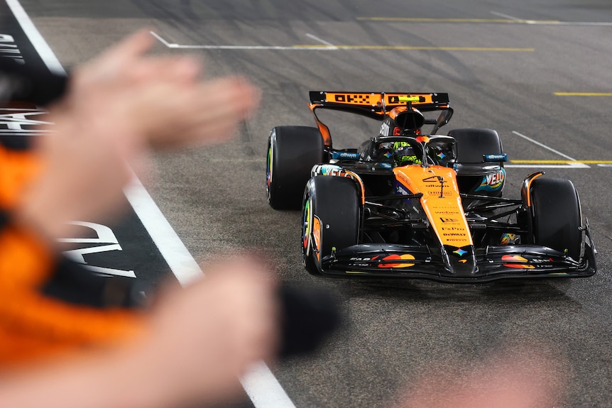 Lando Norris drives his car