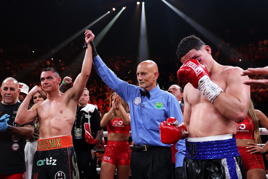 Tim Tszyu has his arm raised