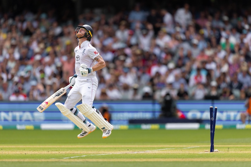 England batter Ben Stokes jumps up and down after getting out in a cricket Test.