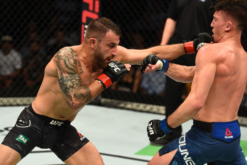 Alex Volkanovski jabs Shane Young during their 2017 UFC fight