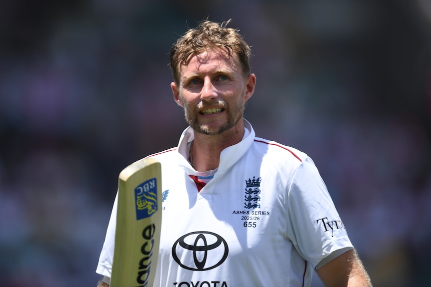 Joe Root smiles