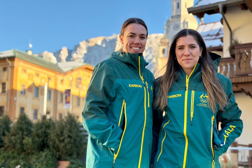 Kiara Reddingius and Bree Walker stand in team Australia kit