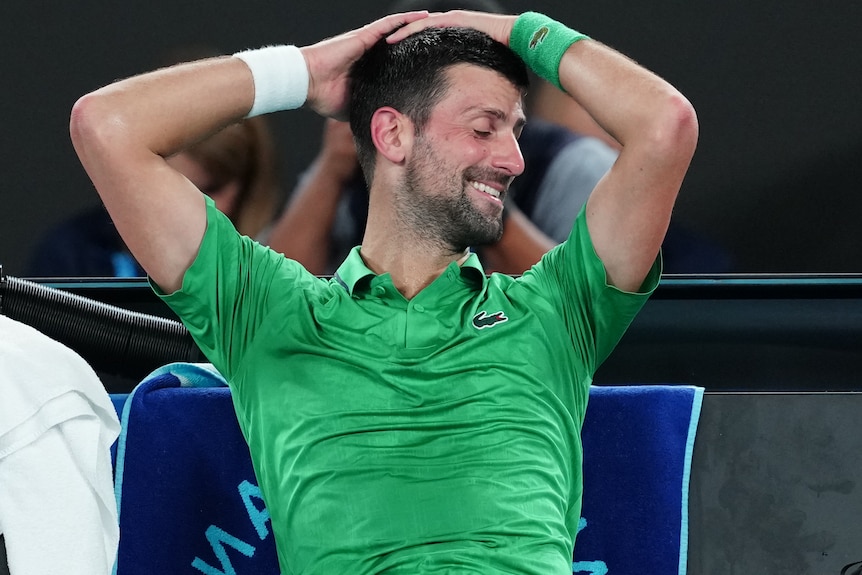 Novak Djokovic smiles after his Australian Open win over Jannik Sinner.