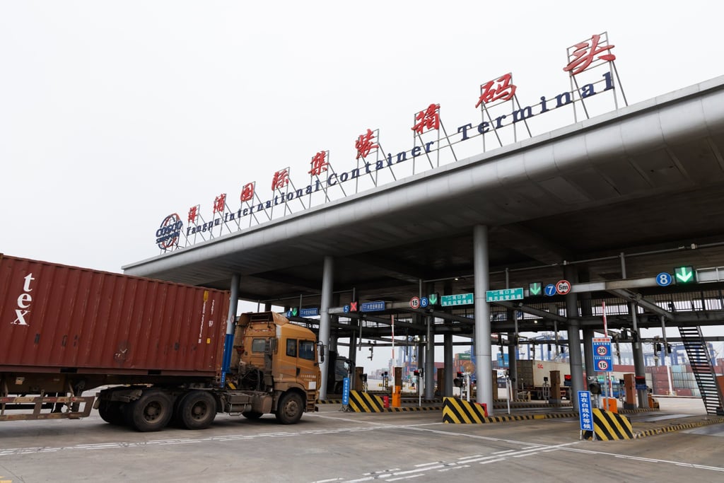 A truck goes through the Yangpu International Container Terminal during a pressure test for the terminal in Danzhou, Hainan province, on December 11. Photo: Xinhua A truck goes through the Yangpu International Container Terminal during a pressure test for the terminal in Danzhou, Hainan province, on December 11. Photo: Xinhua