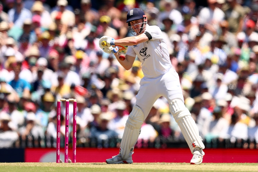 England batter Harry Brook winds up to hit a cricket ball during the SCG Test.