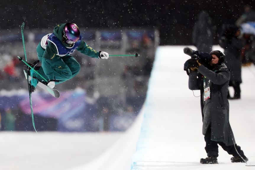 A camera focuses on Indra Brown