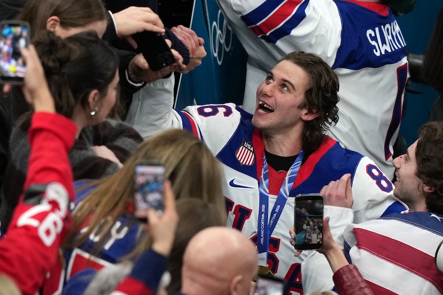 Jack Hughes celebrates after Milano Cortina ice hockey gold medal match