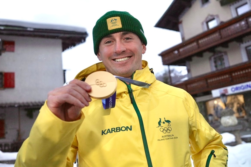 Cooper Woods shows his medal