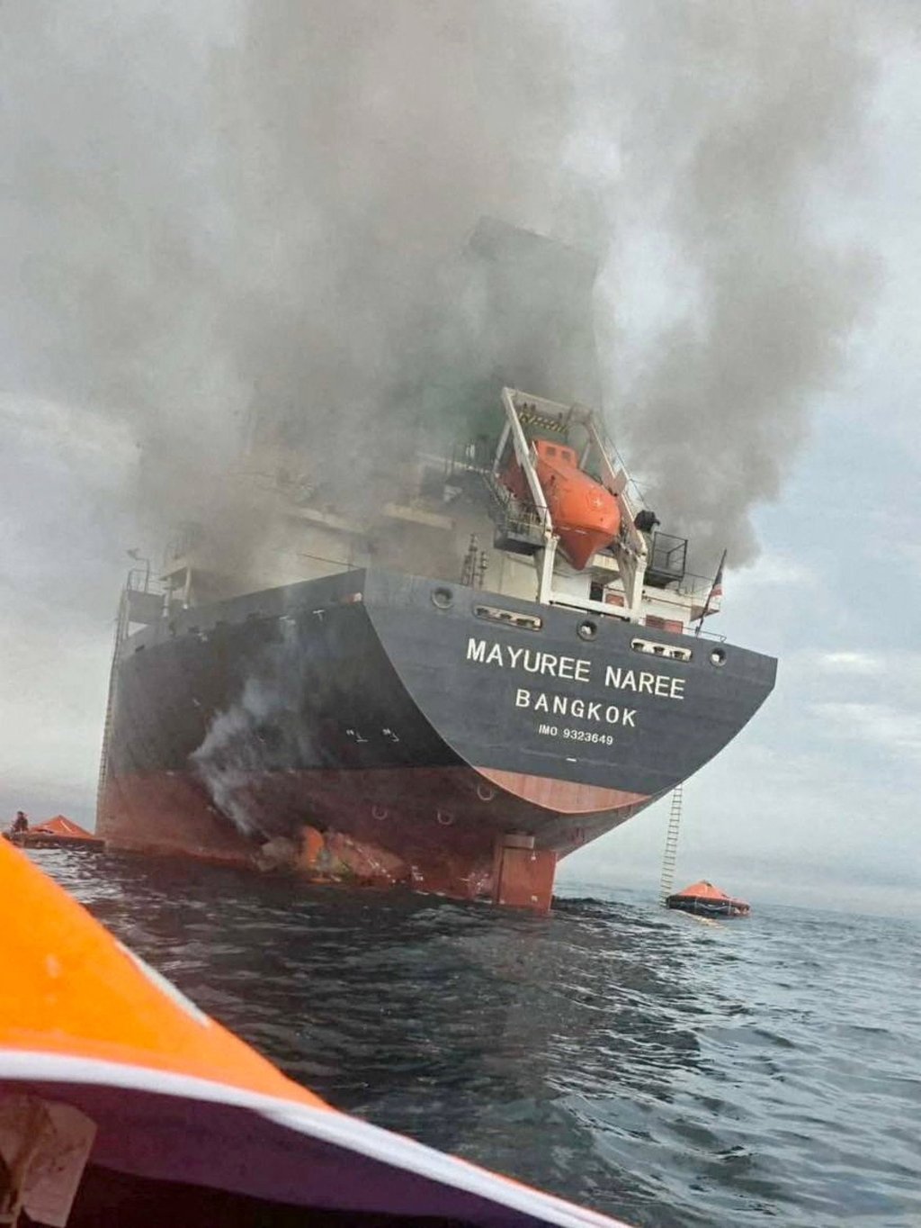 The Thailand-flagged cargo ship Mayuree Naree engulfed in black smoke in the Strait of Hormuz. Photo: Royal Thai Navy via Reuters