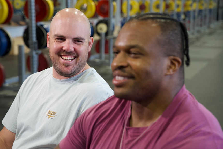 Matt Denny shares a laugh with Lawrence Okoye
