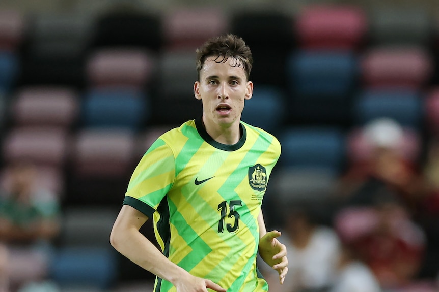 Kai Trewin of Australia controls the ball during a match