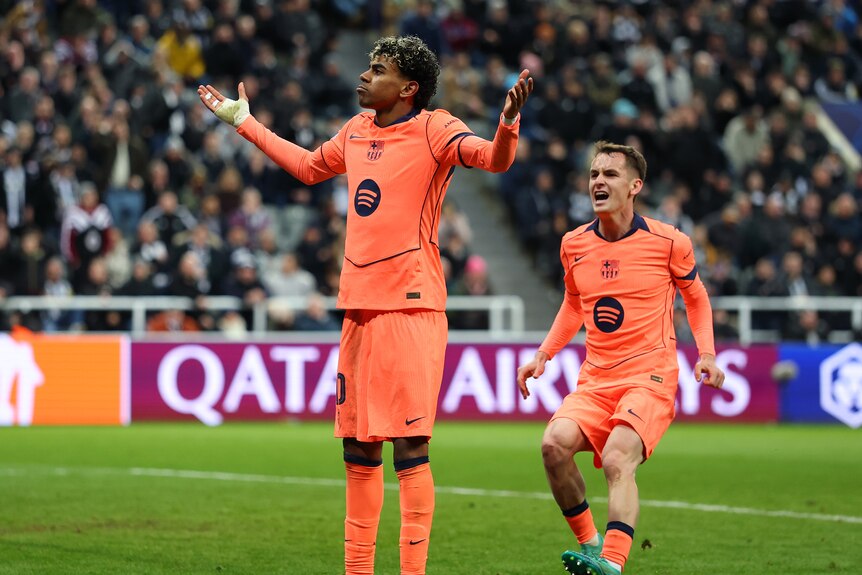 Lamine Yamal celebrates after scoring a late penalty