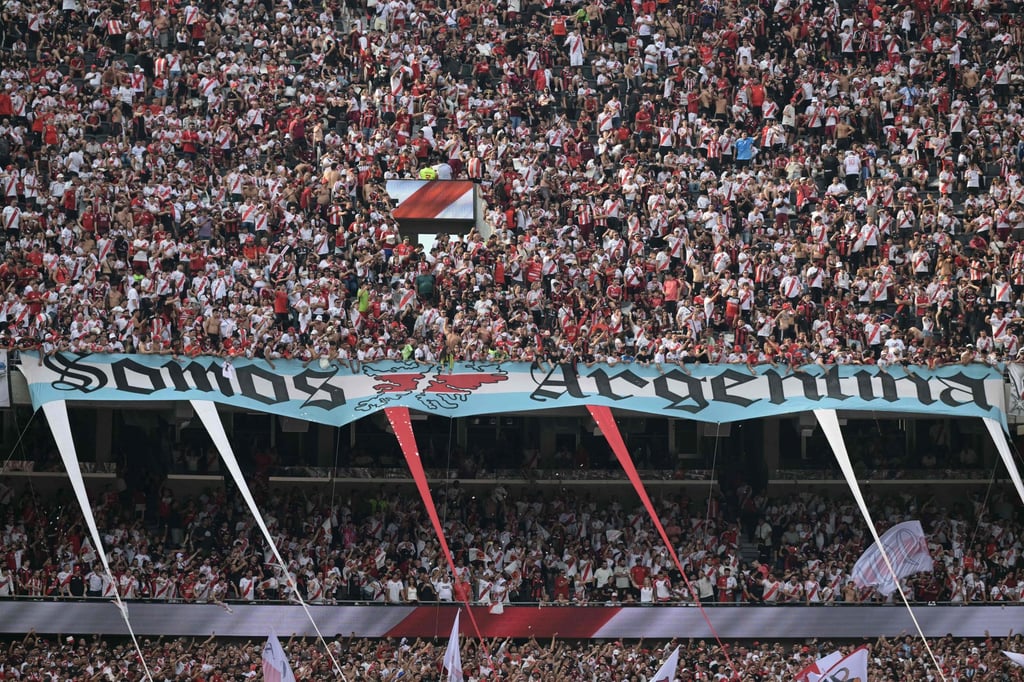 A flag reading ‘We are Argentina’ and featuring a map of the Falkland Islands is displayed ahead of a football match in Buenos Aires on April 19. Photo: AFP