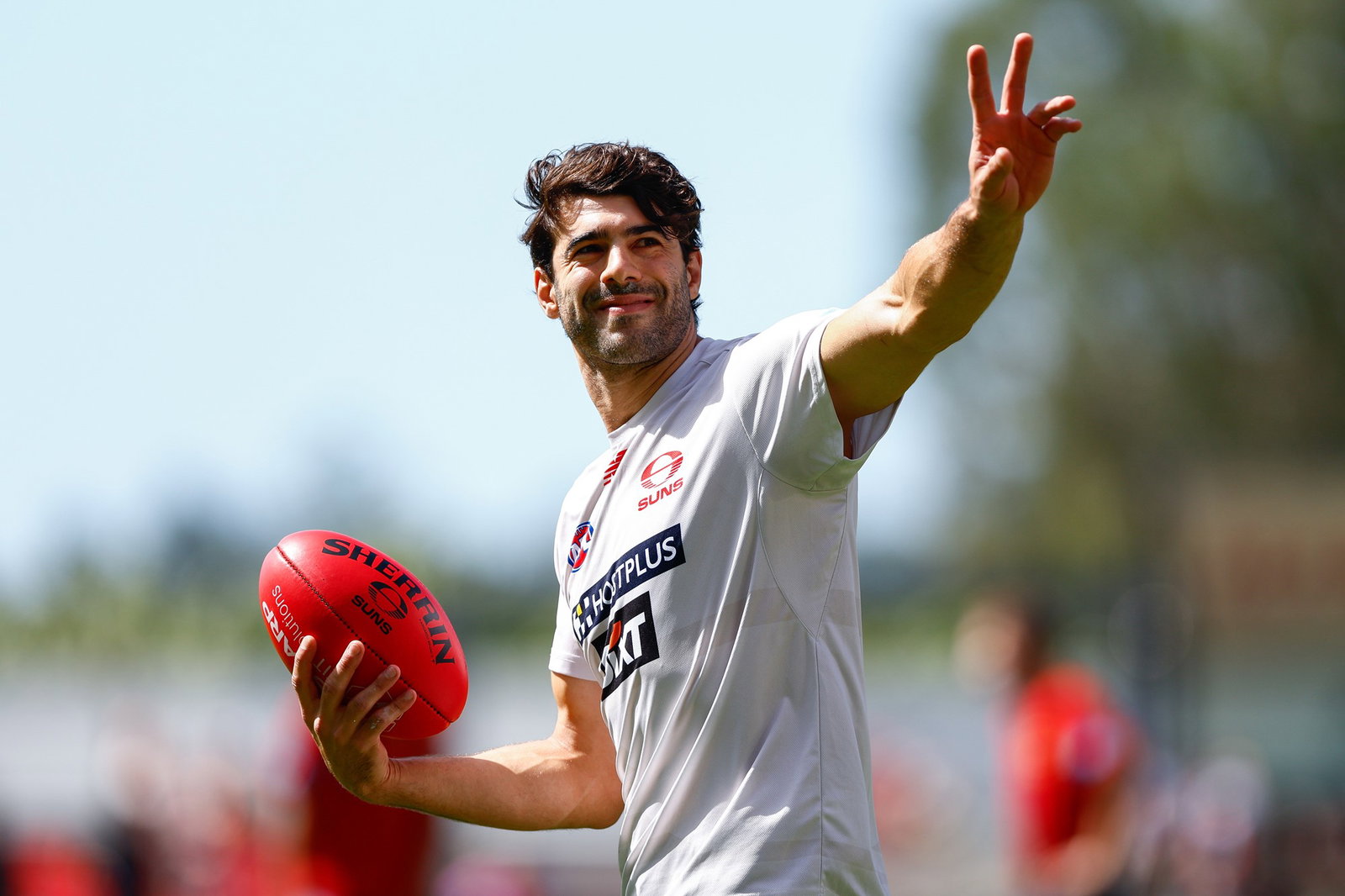 Christian Petracca waves to the crrowd during warm-up.