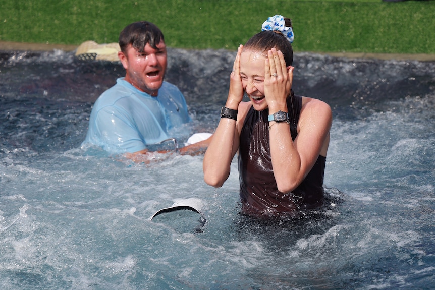 Nelly Korda celebrates in a pool