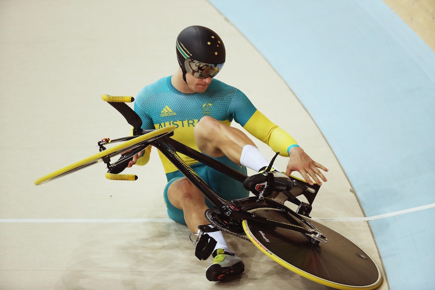 Matt Glaetzer sits on the ground
