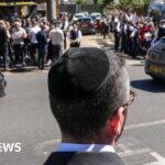 ‘I bought a baseball cap to hide my kippah’: Jews observe first Shabbat after Golders Green attack