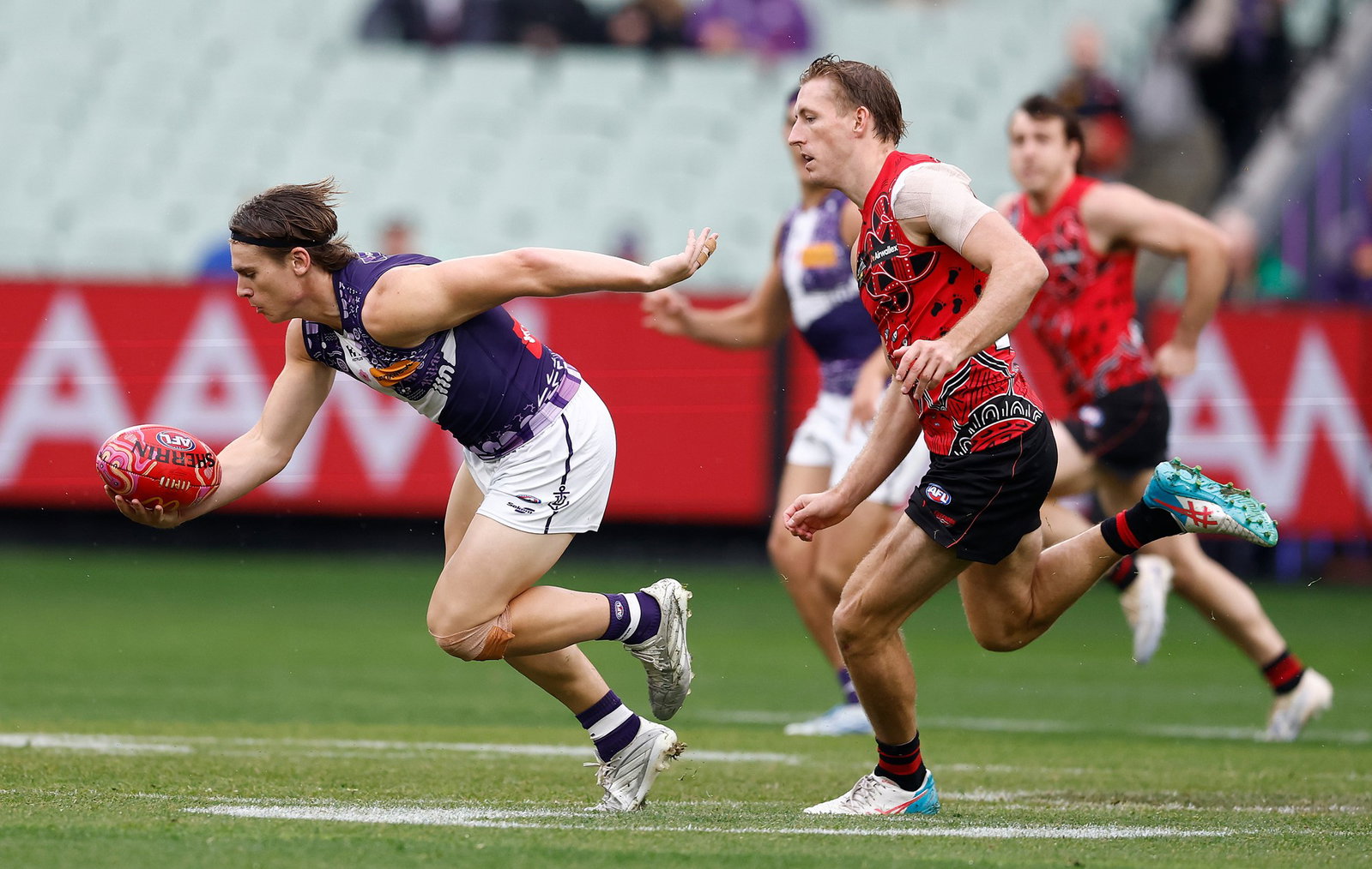Caleb Serong (left) was dominant once again as Fremantle recorded its ninth straight win of the season.
