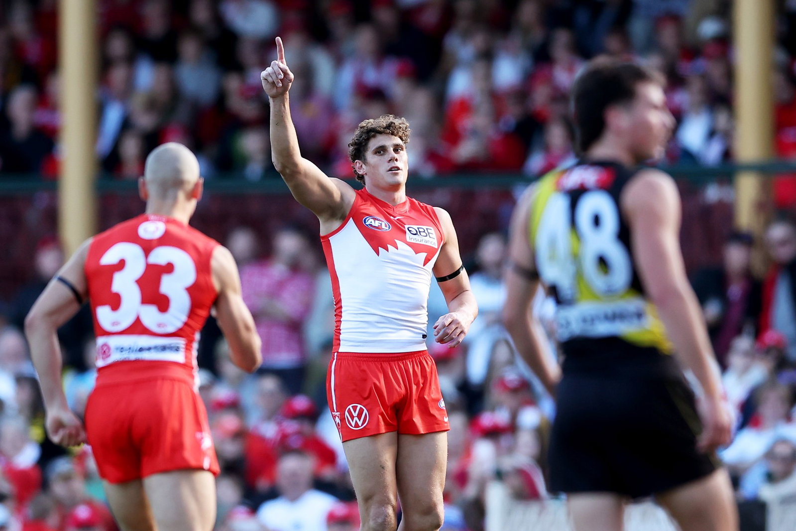 Charlie Curnow of the Swans celebrates with team mates after kicking a goal during the round 12 AFL match between Sydney Swans and Richmond Tigers at Sydney Cricket Ground, on May 30, 2026, in Sydney, Australia.