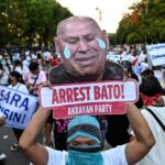 Philippine justice chief orders arrest of senator wanted by ICC