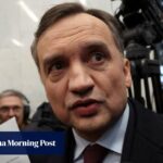 Poland’s ex-minister facing prosecution at home travels from Hungary to US