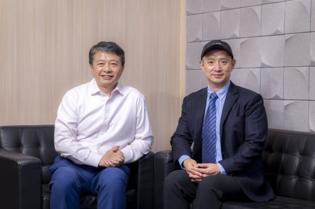 John Li (left), a cybersecurity executive and DBAI student, and Prof Michael Xu (right), programme director and chairman of the Hong Kong AI Foundation.