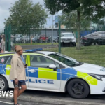 Girl, 14, charged with attempted murder after Manchester school knife attack