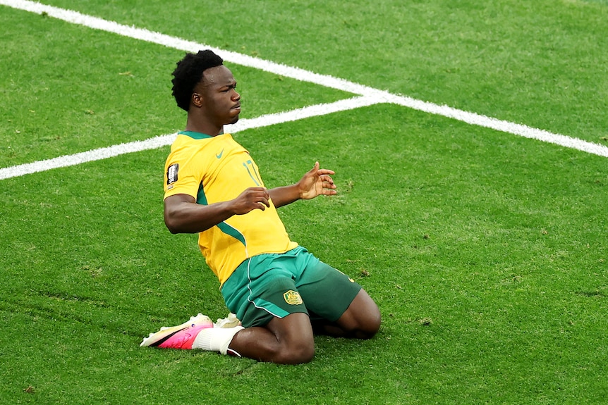 Nestory Irankunda celebrates putting the Socceroos in front