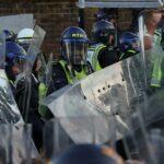Watch: Protesters and riot police clash near home of Nowak’s killer