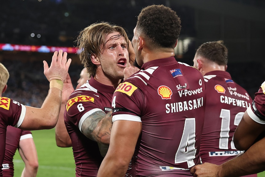 Cameron Munster shouts at Gehamat Shibasaki after a try in State of Origin.