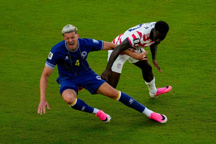 arik Muharemović falls as Folarin Balogun's foot is clear from his ankle.