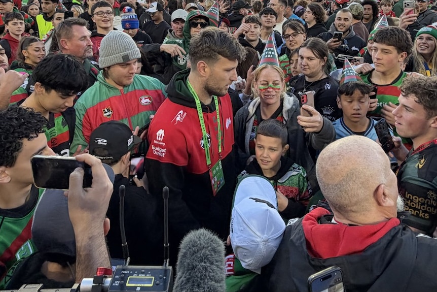 Jai Arrow with South Sydney NRL fans at Stadium Australia.