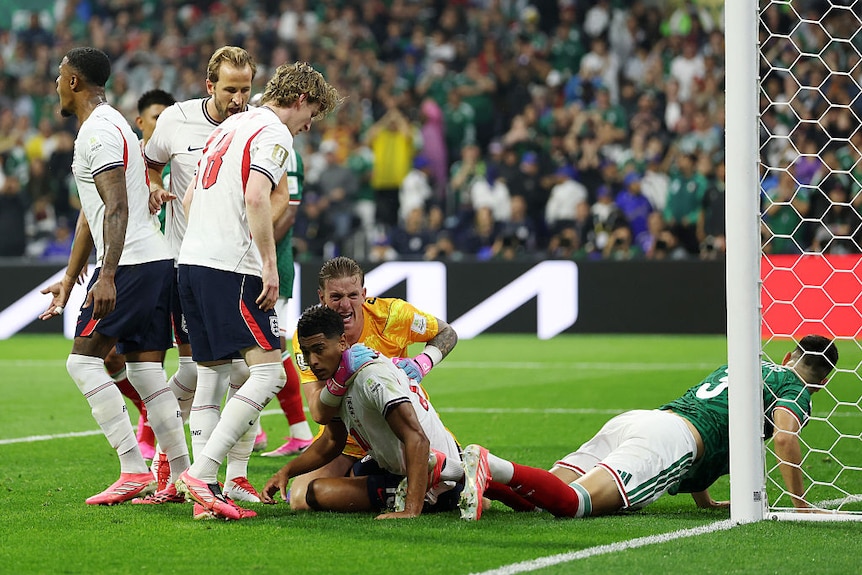 Jordan Pickford hugs Jude Bellingham