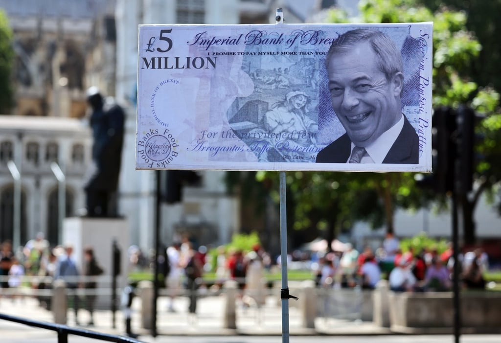 A£5 million note bearing the face of Reform UK leader Nigel Farage is displayed during a protest outside parliament in London on Wednesday. Photo: EPA A£5 million note bearing the face of Reform UK leader Nigel Farage is displayed during a protest outside parliament in London on Wednesday. Photo: EPA