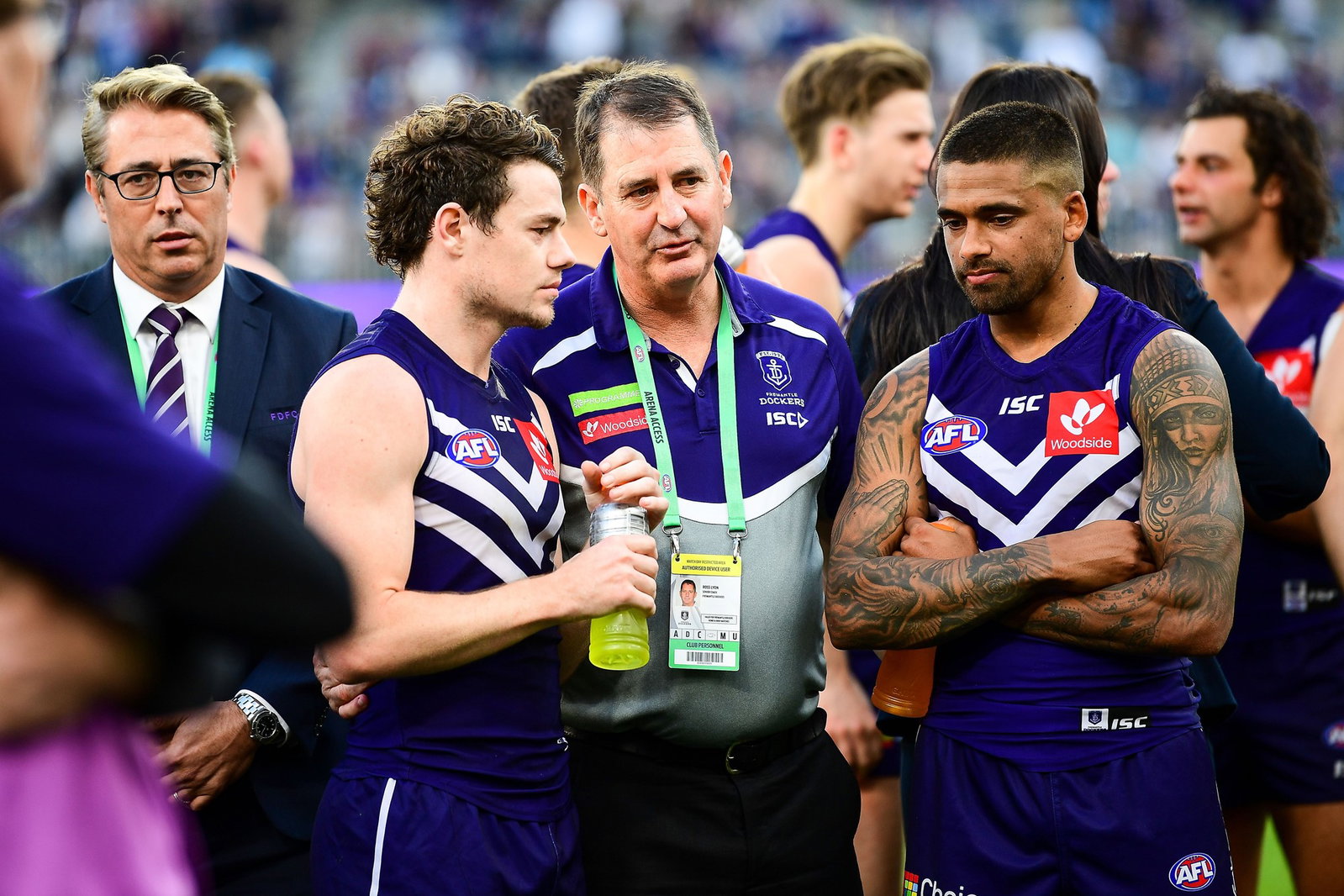  Ross Lyon, coach of the Dockers talks with Lachie Neale and Bradley Hill after the loss during the 2018 AFL round 23 match between the Fremantle Dockers and the Collingwood Magpies at Perth Stadium on August 25, 2018 in Perth, Australia.