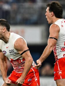 Live: Dockers and Swans battle for top spot as Lions recall big guns