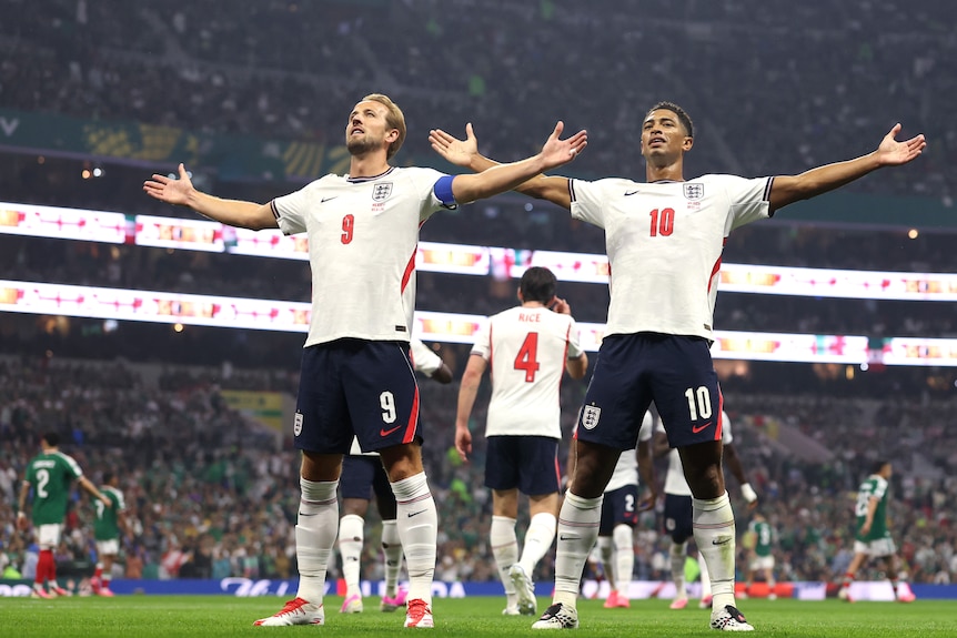 Harry Kane and Jude Bellingham celebrate an England goal