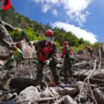 China-Nepal floods: rescuers pull out survivors caked in mud as toll climbs