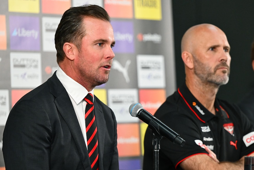 Andrew Welsh and Mark McVeigh speak at a press conference