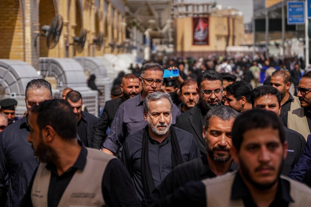 Iran’s Foreign Minister Abbas Araghchi, centre, surrounded by security personnel on Monday in the holy Iraqi city of Najaf ahead of Arbaeen, one of the largest annual Shi’ite religious gatherings. Photo: AP Iran’s Foreign Minister Abbas Araghchi, centre, surrounded by security personnel on Monday in the holy Iraqi city of Najaf ahead of Arbaeen, one of the largest annual Shi’ite religious gatherings. Photo: AP