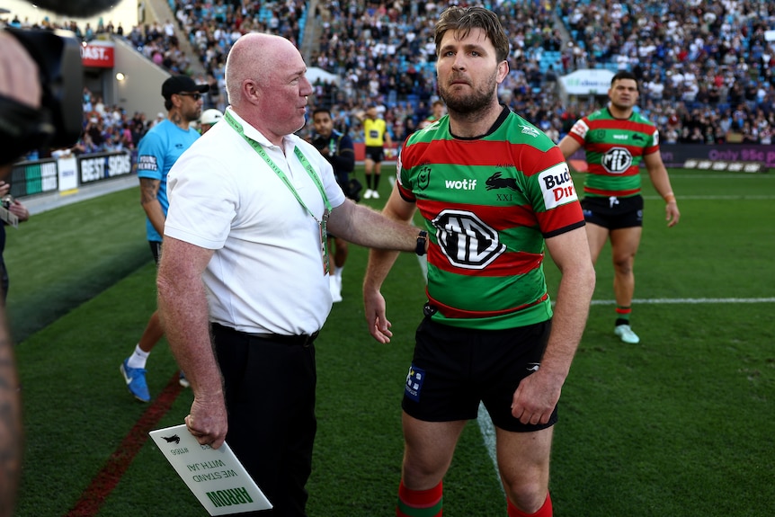 A man is subbed off during a rugby league match