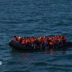 Number of asylum seekers in hotels halves in a year