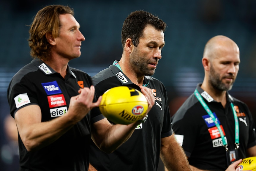 James Hird, Dean Solomon and Mark McVeigh with the Giants