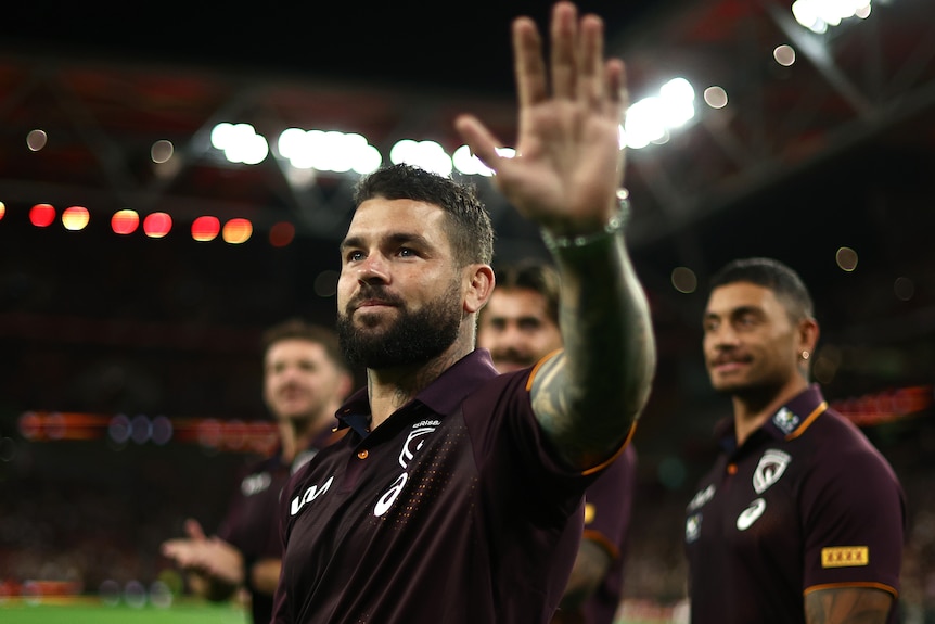 Adam Reynolds waves goodbye to Lang Park.