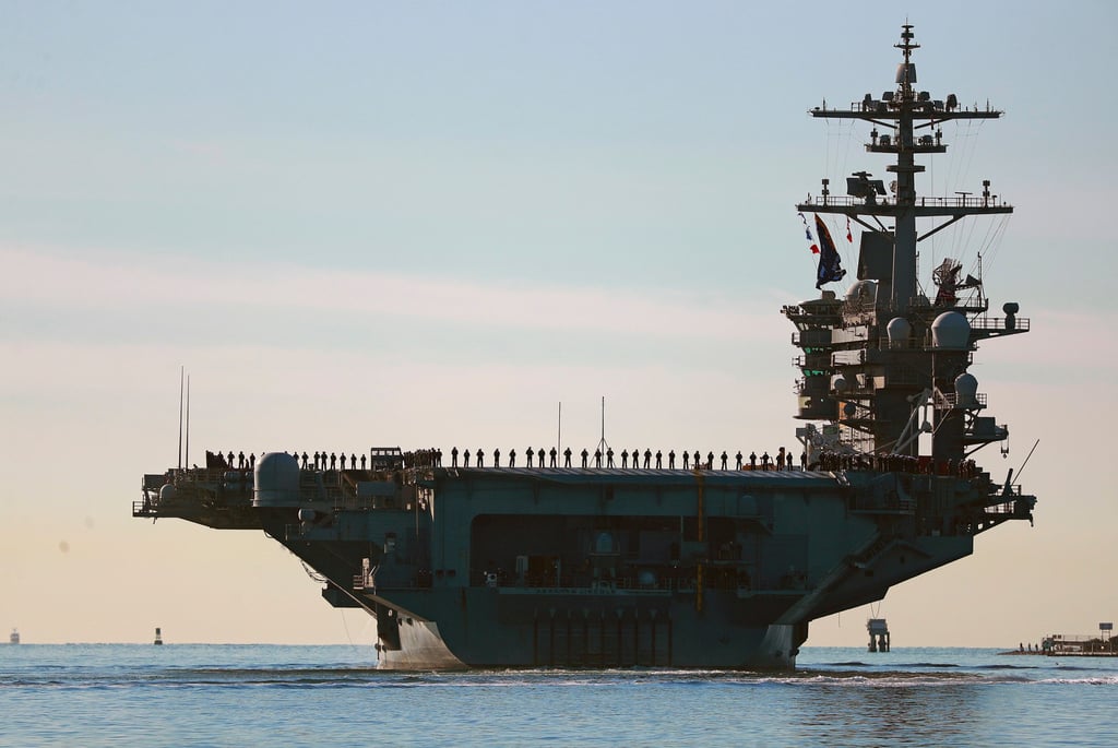 Sailors and Marines line the deck of the USS Abraham Lincoln as it deploys from San Diego in January 2021. Photo: The San Diego Union-Tribune via AP Sailors and Marines line the deck of the USS Abraham Lincoln as it deploys from San Diego in January 2021. Photo: The San Diego Union-Tribune via AP