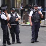 Woman arrested after four stabbed in central London