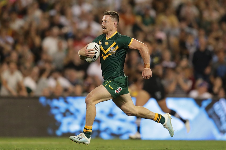 A man scores a try in a test match