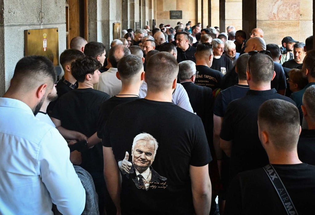 A mourner wears a shirt with the image of Mladic during a military commemoration at the House of the Serbian Army in Belgrade on Saturday. Photo: AFP A mourner wears a shirt with the image of Mladic during a military commemoration at the House of the Serbian Army in Belgrade on Saturday. Photo: AFP