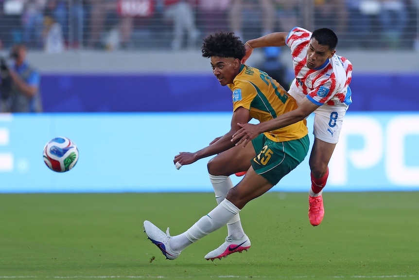 Lucas Herrington stands his ground as Diego Gomez runs into the back of him